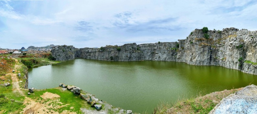 a large body of water surrounded by rocky cliffs