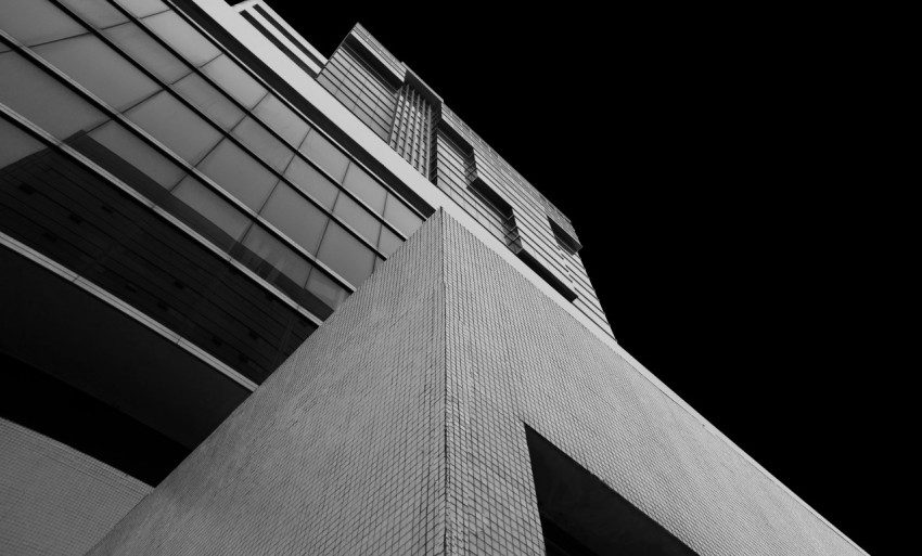 a black and white photo of a tall building