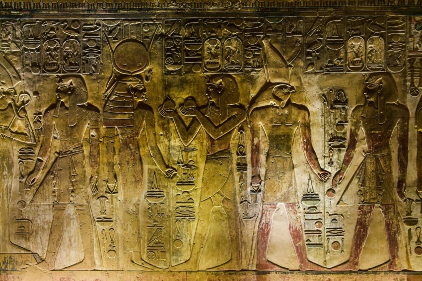 a group of ancient egyptian paintings on a wall