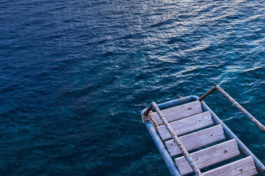 grey metal frame on blue sea