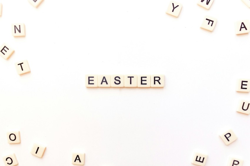 the word easter spelled with scrabbles on a white background
