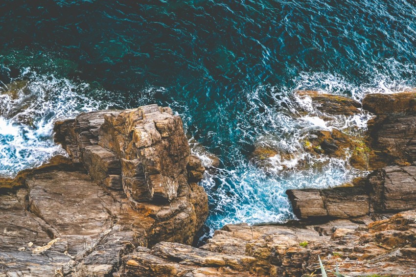 ocean waves crashing rocks