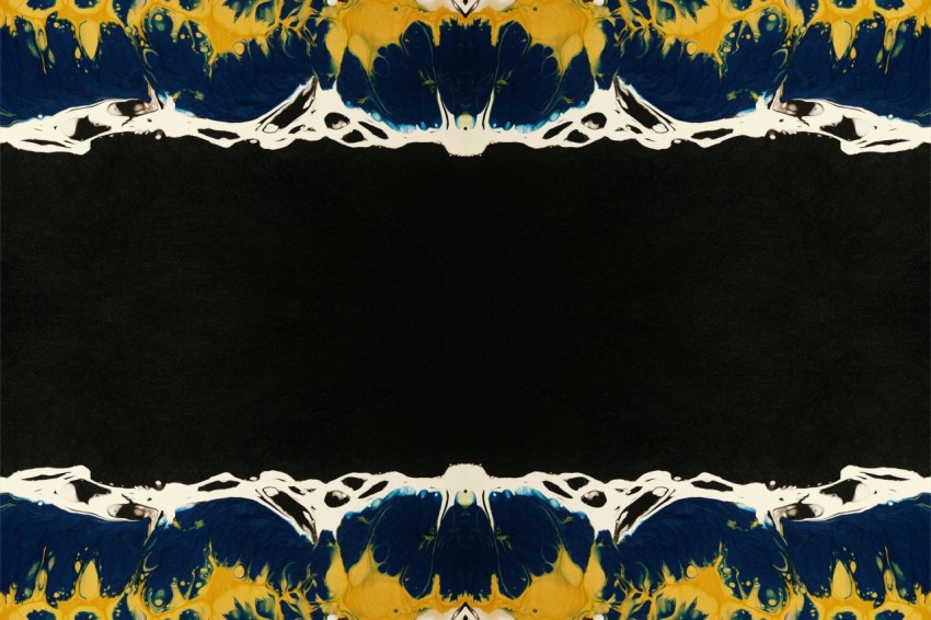 a black background with a yellow and blue design
