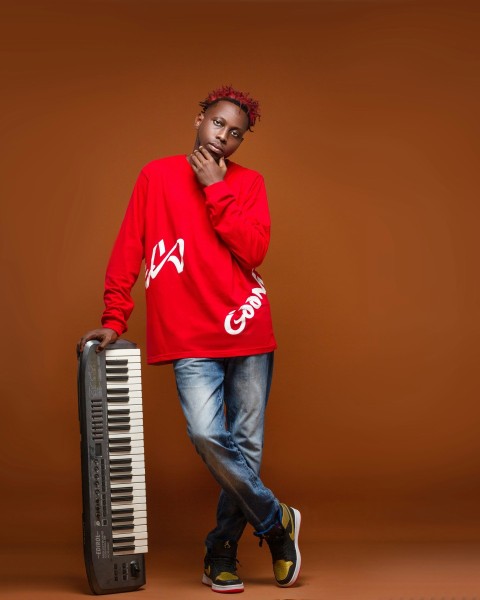 a man holding a guitar