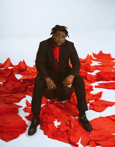 a person sitting on a bed