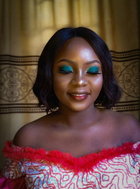 woman in red off shoulder top