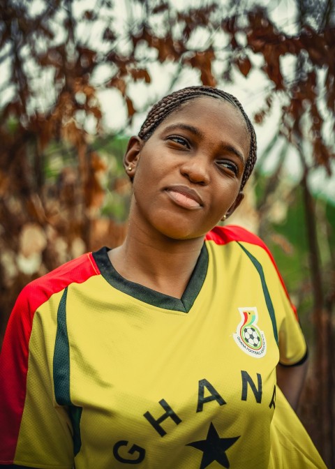 woman in yellow and red v neck shirt