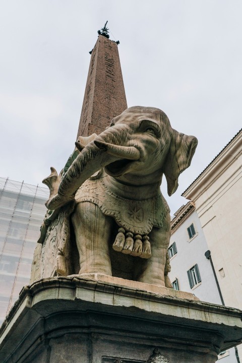 gray concrete statue of man