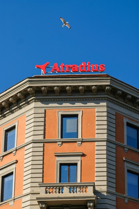 a building with a bird flying over it