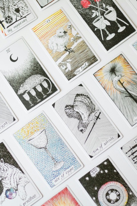 a bunch of cards that are on a table