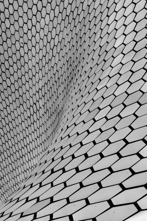 a close up of a black and white design