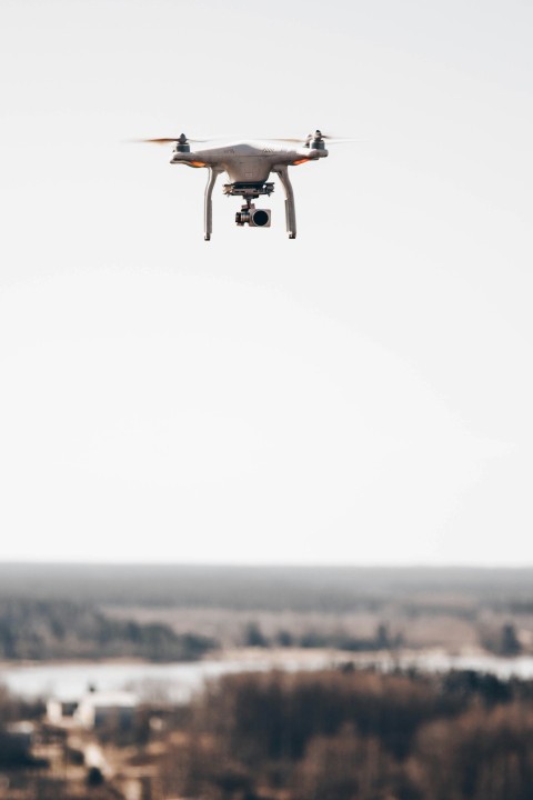 shallow focus photo of gray drone camera 7tONbQ5ra