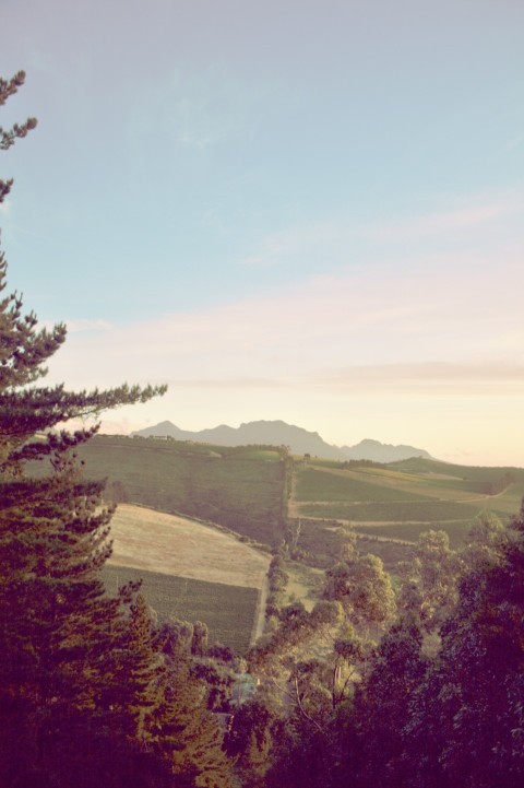 a scenic view of a mountain range at sunset ijthzM